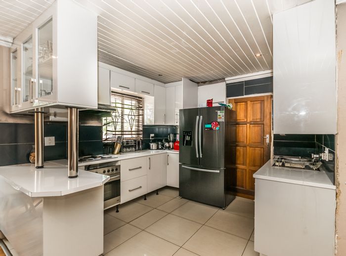 For Sale: 4-Bedroom House in Cosmo City with garage, lounge, and pyjama lounge.