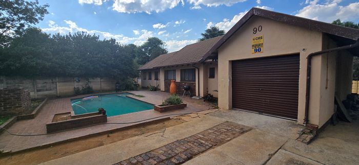 For Sale: Spacious Morehill house with pool, garden, and flexible living spaces.