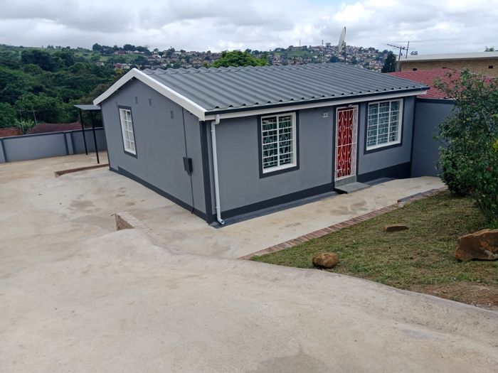 For Sale: Northdale House with upgraded kitchen, spacious yard, and double carport.