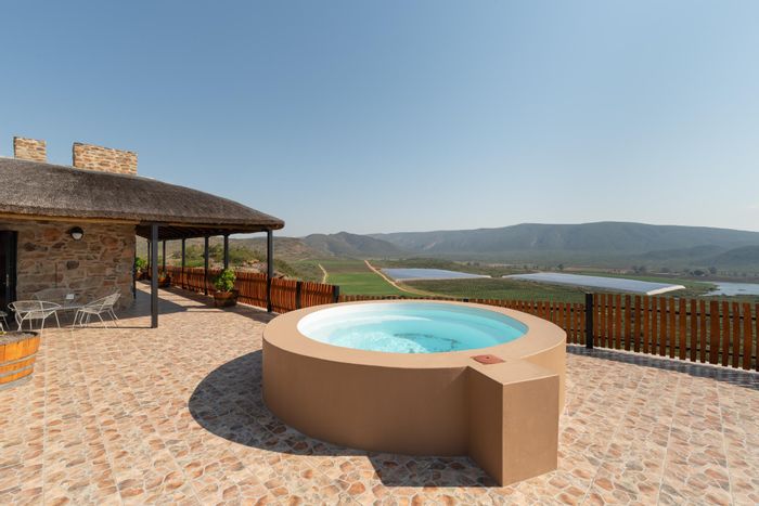For Sale: House in Mcgregor Central with wrap-around verandah, plunge pool, and double garage.