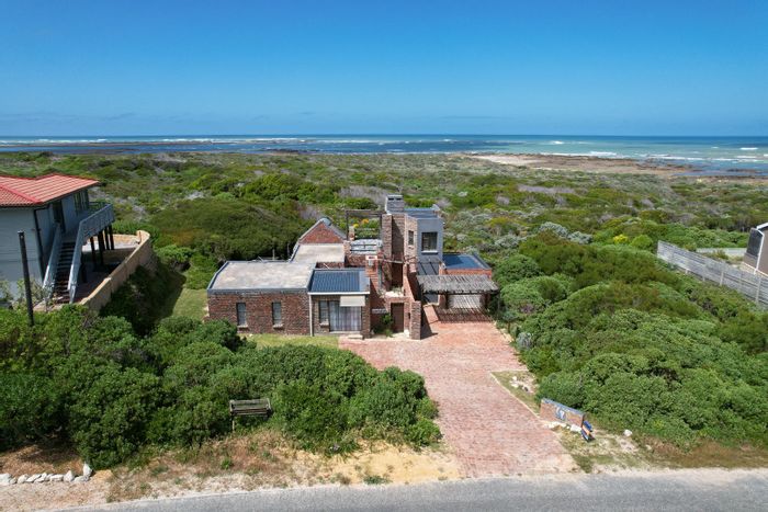 For Sale: House in Suiderstrand Central with ocean views, garden, and rental potential.