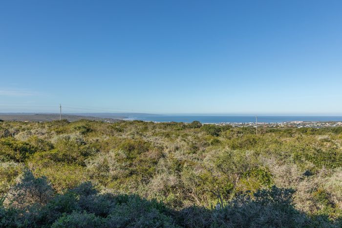 House for Sale in Stilbaai Wes: Panoramic views, spacious living, and recreational activities.