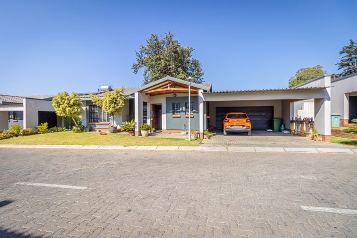 For Sale: Townhouse in Waterkloof AH with pool, garden, and secure estate living.