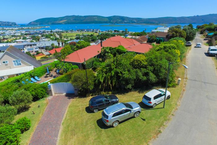 Historic House in Knysna Central For Sale: Multiple accommodations, lagoon views, and gardens.