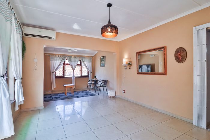 For Sale: House in Mobeni with 3 bedrooms, spacious garden, and ample parking.