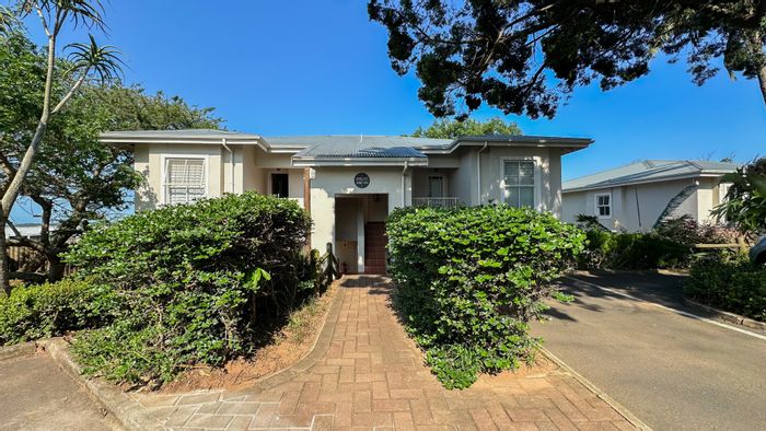 For Sale: 2-bedroom apartment in Ballito Central with pool, clubhouse, and garage.