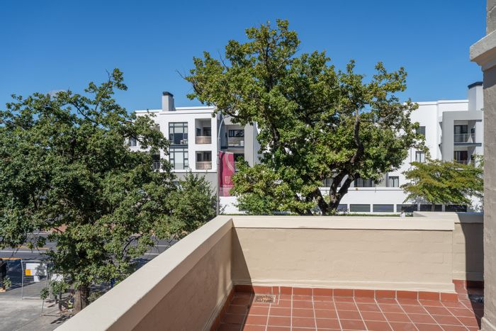 For Sale: Two-bedroom apartment in Stellenbosch Central with balcony, parking, and security.