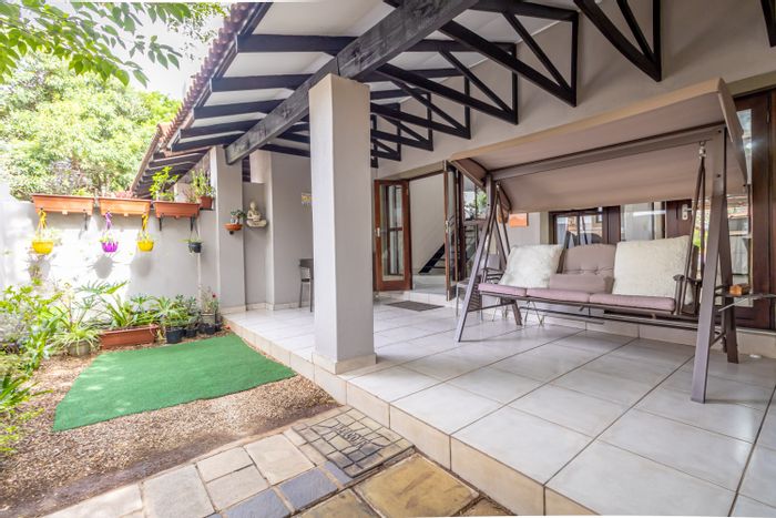 For Sale: Fourways Apartment with private garden, garage, and ample storage space.