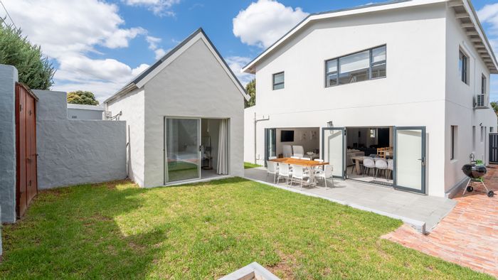 For Sale: Voelklip House with 4 bedrooms, garden, outdoor shower, and garage.