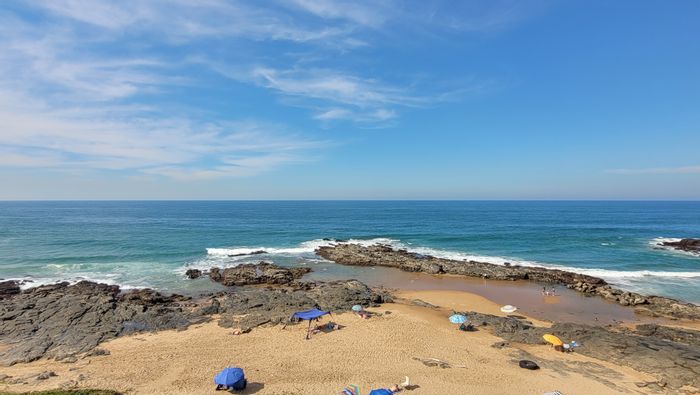 Beachfront Apartment For Sale in Willard Beach with pool, garage, and ocean views.