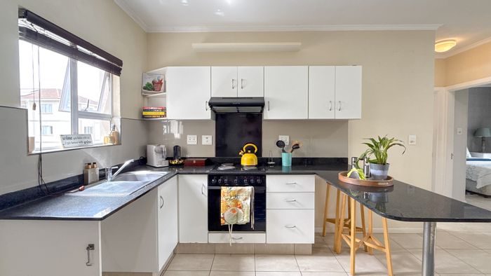 For Sale: 2-Bedroom Apartment in Ballitoville with pool, security, and scenic views.