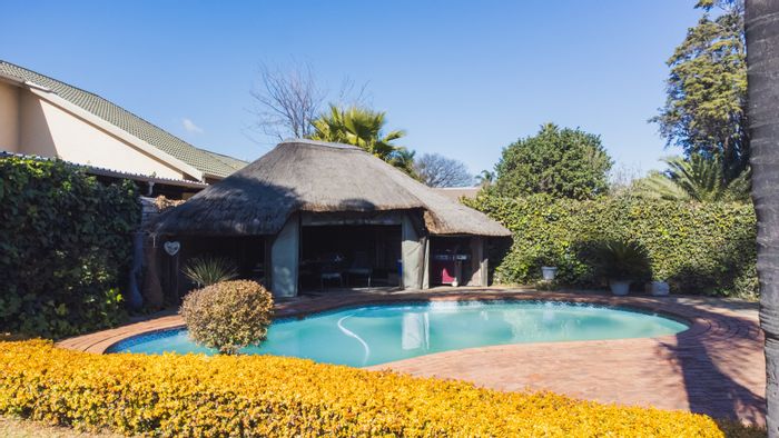 For Sale: House in Parkrand with solar system, pool, and spacious garden.