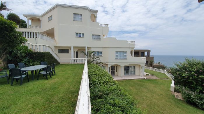 For Sale: House in Compensation Beach with four duplexes, ocean views, and rental potential.