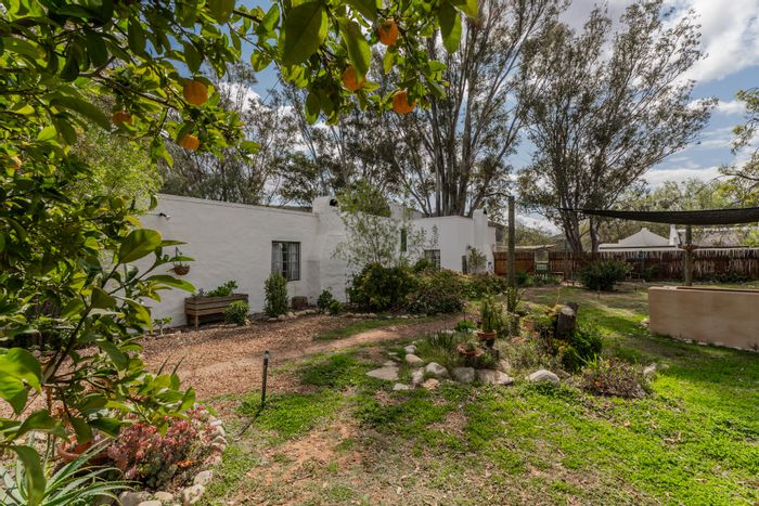 Charming McGregor Central house with large garden, natural pool, and character features. For Sale.