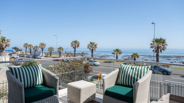 For Sale: Beachfront Apartment in Mouille Point with pool, parking, and private courtyard.