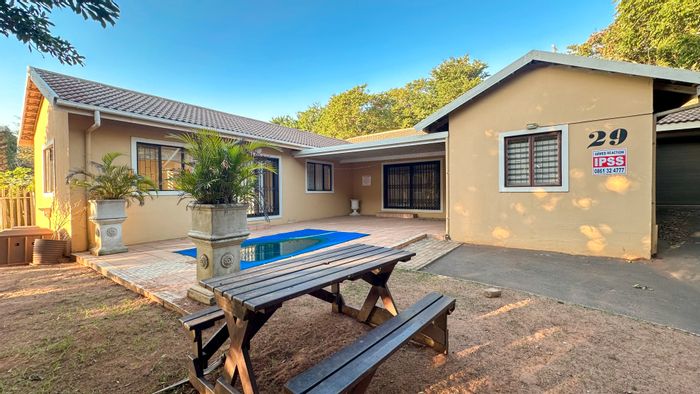 For Sale: 4-bedroom house in Sheffield Beach with pool, garage, and greenbelt views.