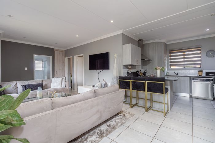 Ground floor apartment in Homes Haven with garden, braai, and 24-hour security.