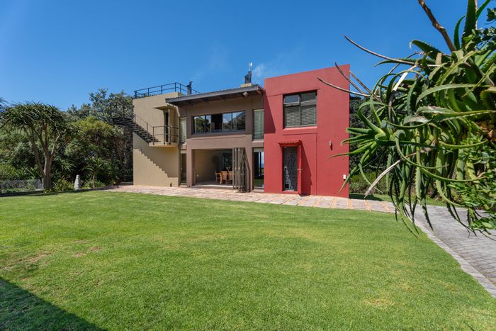 For Sale: House in Bettys Bay Central with ocean views, fireplace, and solar power.