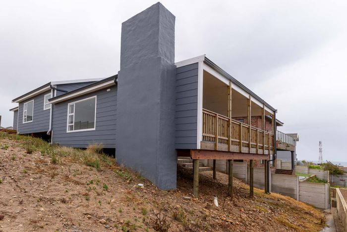 For Sale: House in Seemeeu Park with sea views, deck, and double garage.