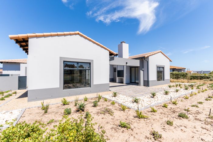 For Sale: House in Langebaan Country Estate with golf course, triple garage, and amenities.