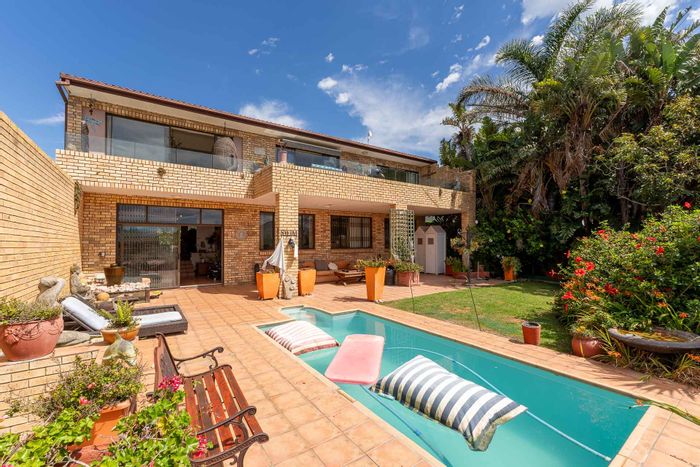 For Sale: Spacious Signal Hill house with 7 bedrooms, pool, and income potential.