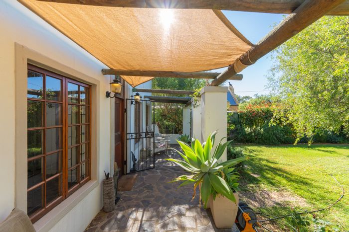 3-bedroom house in McGregor Central for sale with garage, solar system, and braai area.