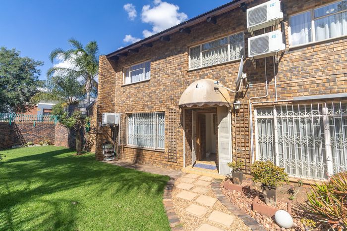 4-Bedroom Townhouse For Sale in Sterpark with Garage, Garden, and Water Tanks.