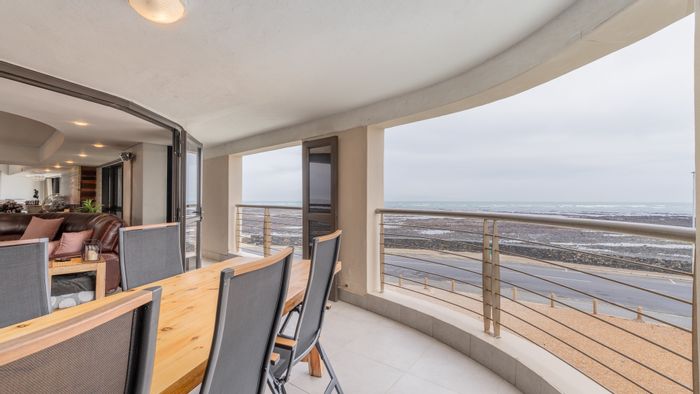 Coastal apartment in Strand South for sale: 3 bedrooms, sea views, large balcony.