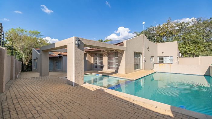 For Sale: Spacious Randpark Ridge house with pool, office, and entertainment areas.