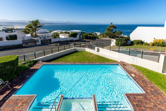 For Sale: 2-bedroom apartment in Plettenberg Bay Central with garden, pool, and parking.