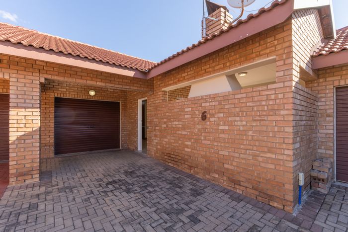 For Sale: 2-Bedroom Townhouse in Waterberry Country Estate with secure parking and garden.