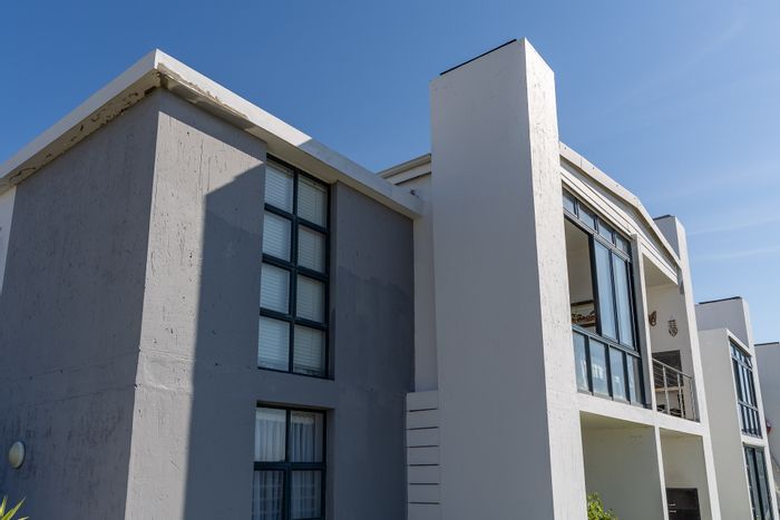 Coastal apartment in Island View for sale, featuring panoramic views and secure parking.