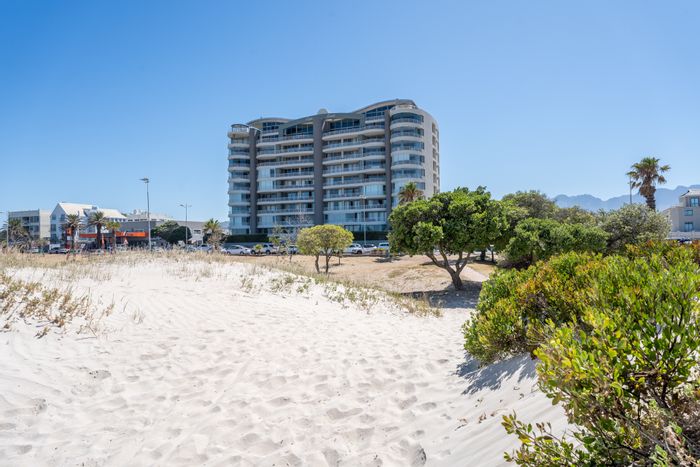 For Sale: Apartment in Strand North with ocean views, pool, gym, and parking.