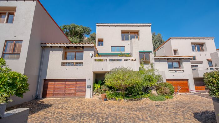 For Sale: Bedford Park Townhouse with 3 beds, outdoor patios, and solar power.