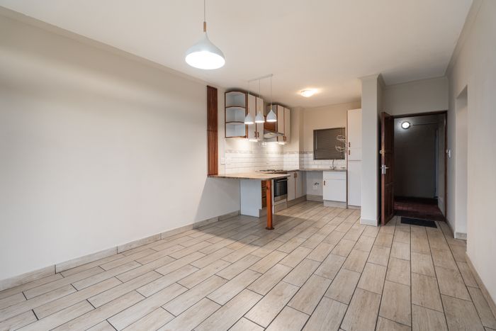 For Sale: Apartment in Whispering Pines with pool, garden, and secure parking.