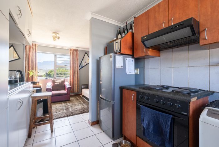 For Sale: 2-bedroom apartment in Anchorage Park with open-plan living and parking.