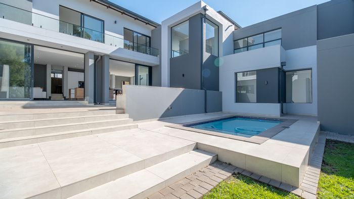 For Sale: House in Midstream Ridge Estate with pool, bar, and security features.