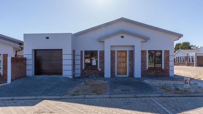 3-Bedroom Townhouse For Sale in Albertinia Central with garage and low-maintenance garden.