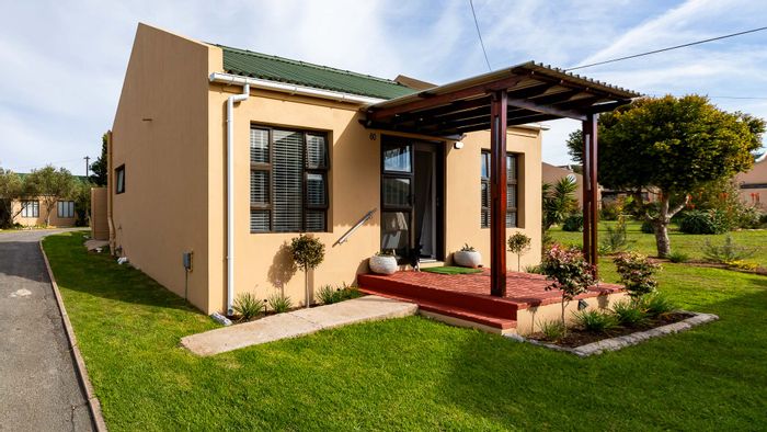 For Sale: Townhouse in Stilbaai Wes with garden, pool, and secure parking.