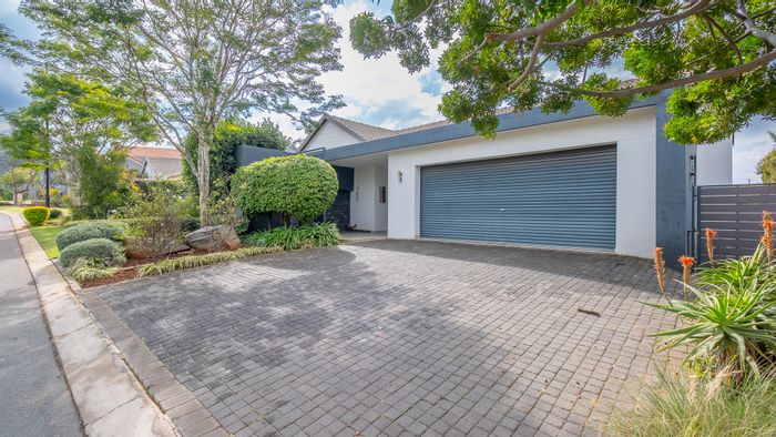 For Sale: House in Midstream Ridge Estate with 4 bedrooms, braai room, and garden.