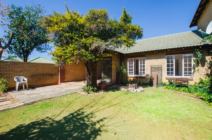 For Sale: Moreleta Park Townhouse with 3 beds, private garden, and garage.