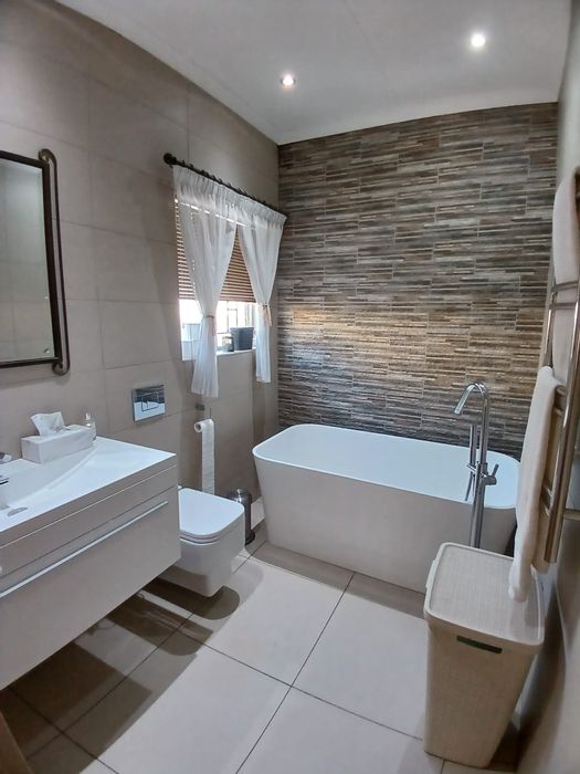 For Sale: Spacious 4-Bed House in Sasolburg Ext 11 with garage and garden.