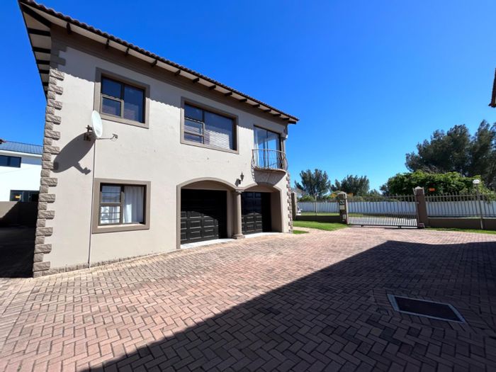 For Sale: Townhouse in Jeffreys Bay Central with private patio and rental potential.