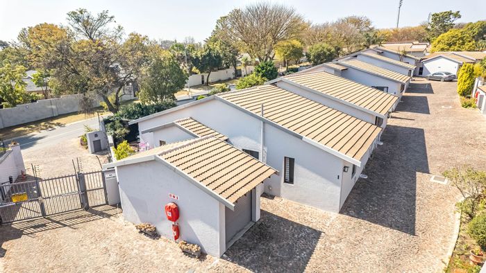 Fourways Townhouse For Sale: 2 beds, pool, garage, security, and storeroom.