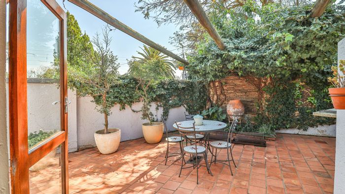 For Sale: Fourways Townhouse with pool, garage, and private patio.