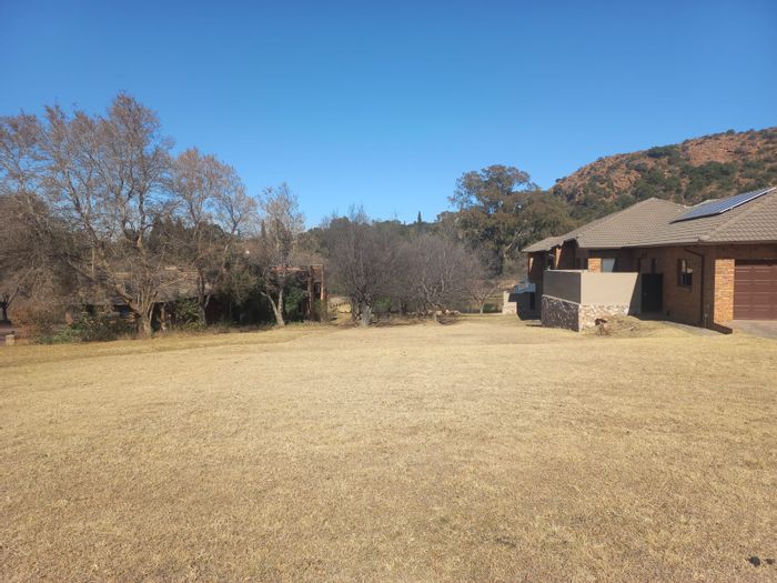 Vacant Land for Sale in Heidelberg Kloof Estate with clubhouse, tennis court, and pool.