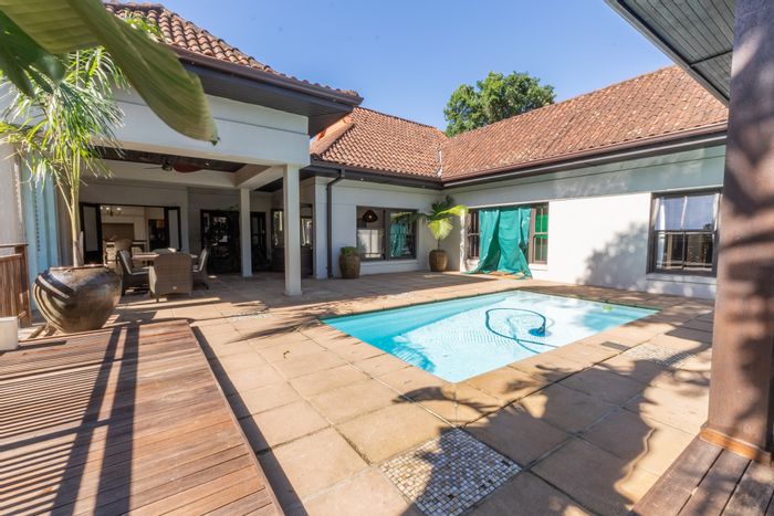 Zimbali House For Sale: 4 bedrooms, pool, gardens, and exclusive resort amenities.