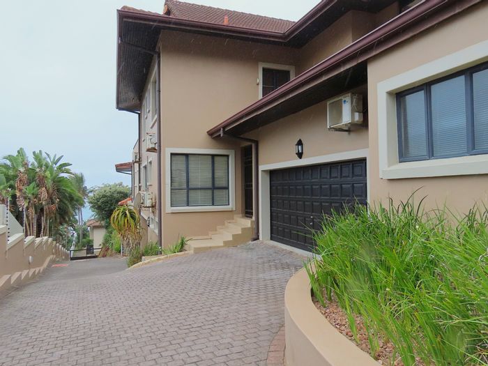 For Sale: Beachfront Townhouse in Shakas Rock with ocean views and private access.