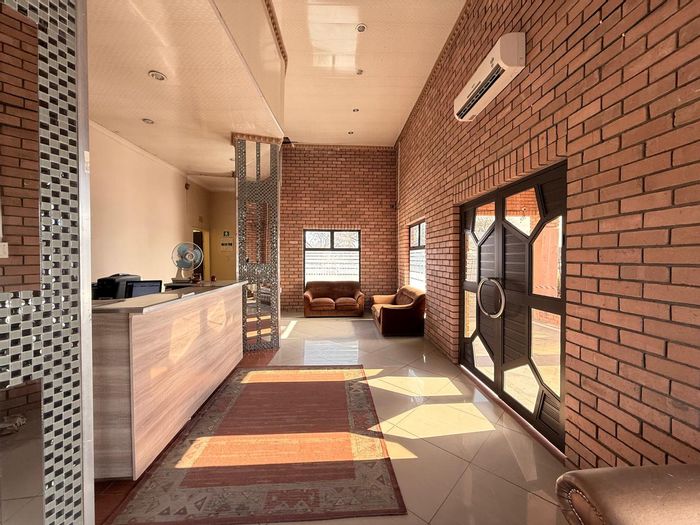 Newcastle Central Guest House For Sale: 11 rooms, liquor license, business zoning.