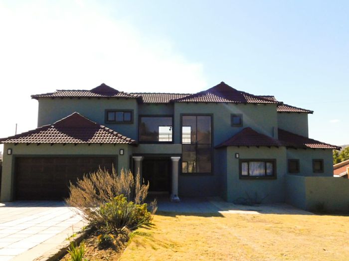 For Sale: Spacious 4-bedroom house in Overkruin with garden, study, and braai area.